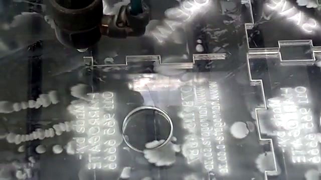 CO2 nozzle cutting clear acrylic money-box parts (SKU ask)