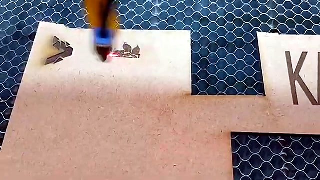 Yellow TruCUT head engraving tag on honeycomb (SKU ask)