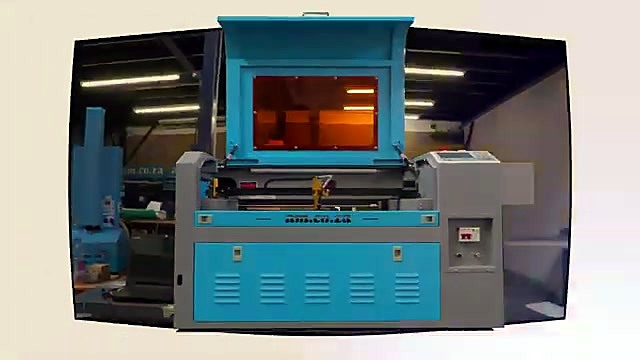 Desktop CO2 lid open in workshop overview (SKU ask)