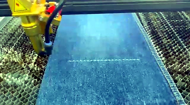 TruCUT starting zig-zag engrave on blue denim (SKU ask)