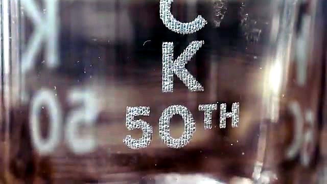 Frosted JACK 50TH engraving close on clear glass (SKU ask)