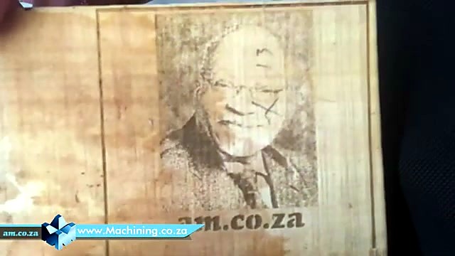 Finished portrait plaque with engraved am.co.za (SKU ask)