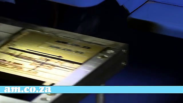 Laser engraving am.co.za on gold Rowmark (SKU ask)