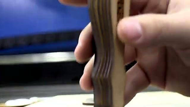 Layered Supawood handle close-up (SKU ask)