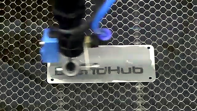 Gantry engraving BrandHub logo on plate (SKU ask)