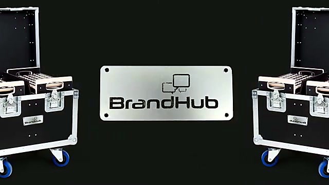 Finished BrandHub plate between flight cases (SKU ask)