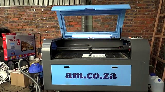 CLEAR am.co.za blue front panel on open-lid TruCUT cabinet (SKU ask)
