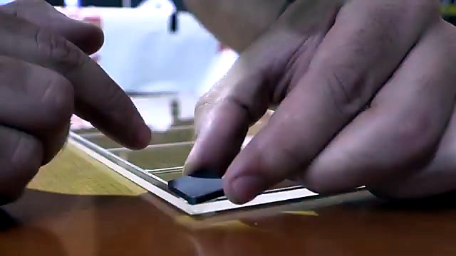Peeling film revealing white engraved weekly grid (SKU ask)