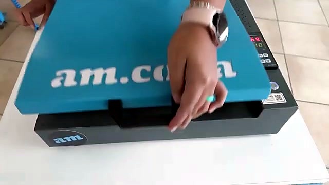 Blue am.co.za lid lifted by black handle (SKU ask)