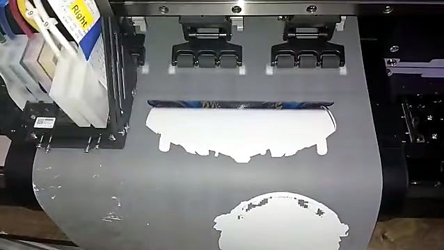 Ink dampers + pinch rollers on grey DTF film (SKU ask)