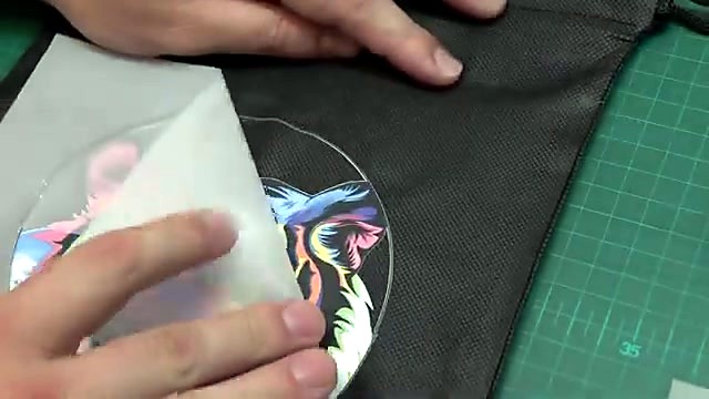 Peeling DTF film from black fabric after heat press (SKU ask)