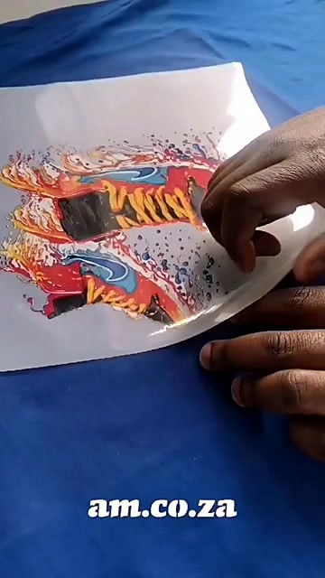 Sneaker DTF film placed on blue tee (SKU ask)