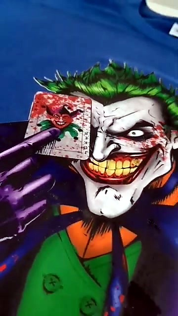 Peel DTF film revealing Joker on blue tee (SKU ask)