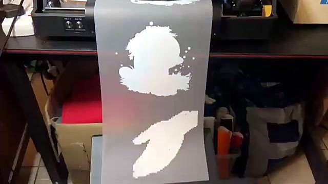 Printed film exiting toward shaker (SKU ask)