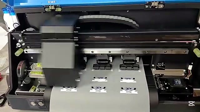 Carriage laying white underbase circles on film (SKU ask)