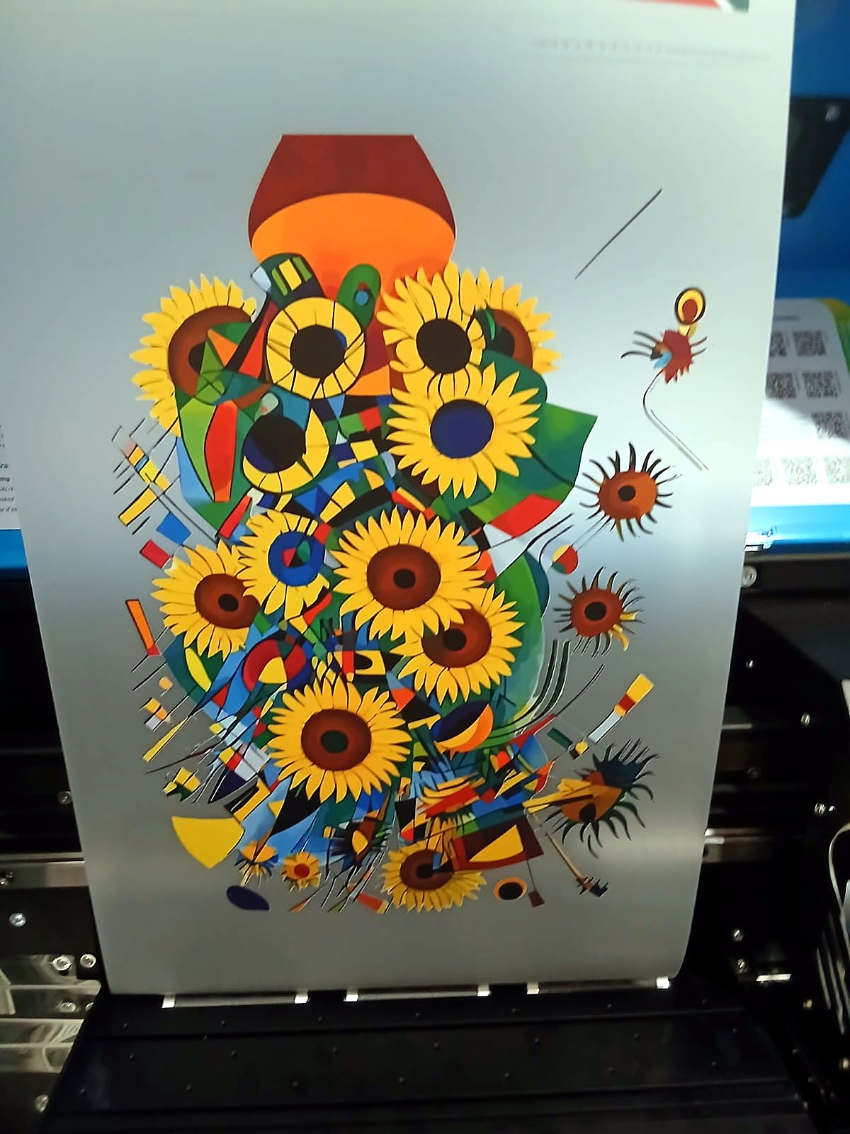 F-DTF/A3: colourful sunflower artwork printed on DTF transfer film coming off the A3 XP600 DTF printer (customer photo)