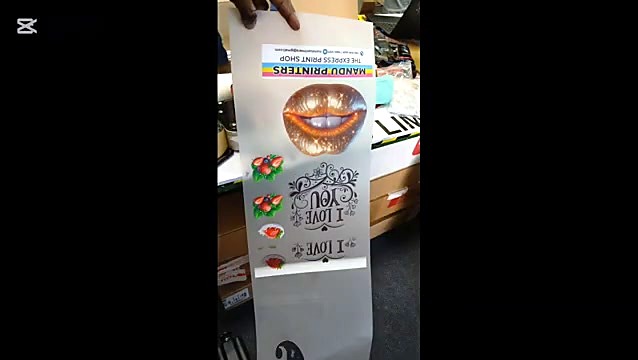 Printed film sheet held — lips + shop brand (SKU ask)