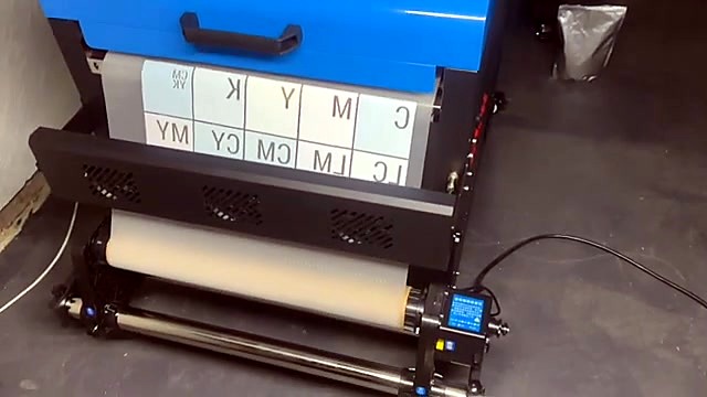 Rear film roll with CMYK/W test blocks (SKU ask)