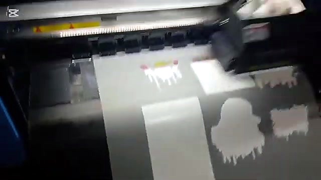 Pinch rollers + carriage over grey film (SKU ask)