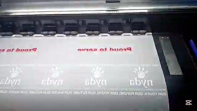 Carriage printing nyda logos on translucent DTF film (SKU ask)