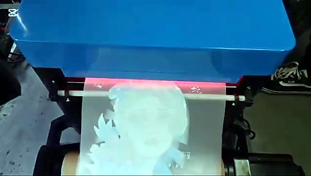 Tattoo portrait film entering blue heater (SKU ask)