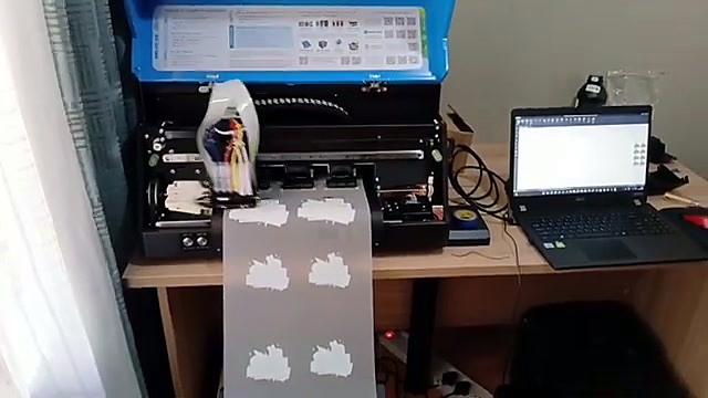 A3 blue-lid printer + laptop overview mid-print (SKU ask)
