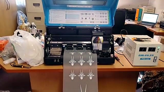 Open lid carriage feeding BOSMAC film (SKU ask)