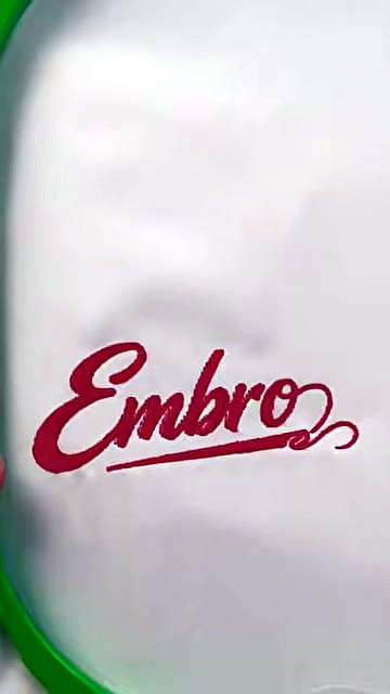 Finished red Embro logo in green hoop (SKU ask)