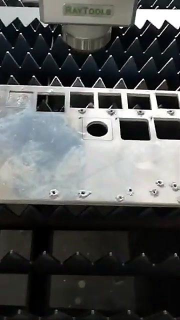 Rectangular + circular holes cut in Al (SKU ask)