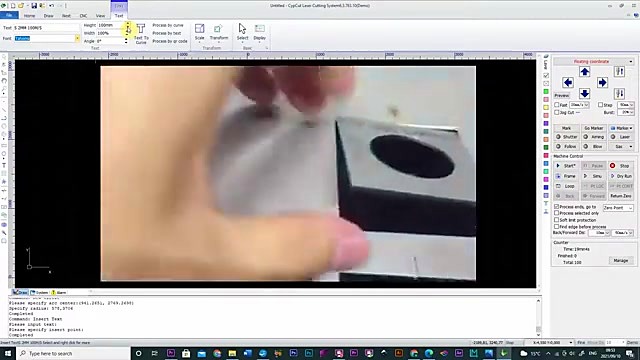 Hand holding finished steel square with hole (SKU ask)