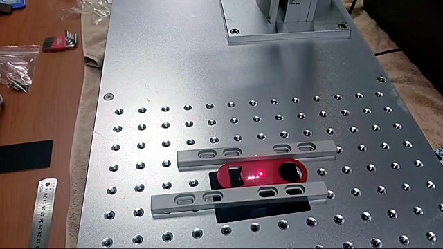 Beer opener in jig + red pilot laser (SKU ask)