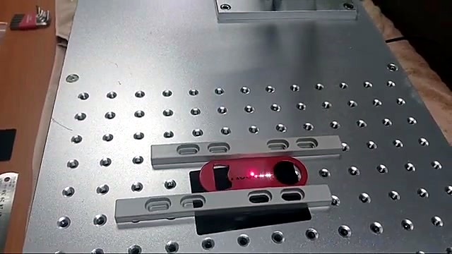 Grid-hole bed + slotted jig rails close (SKU ask)