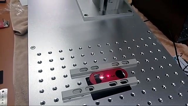 Pilot laser dot centered on red opener (SKU ask)