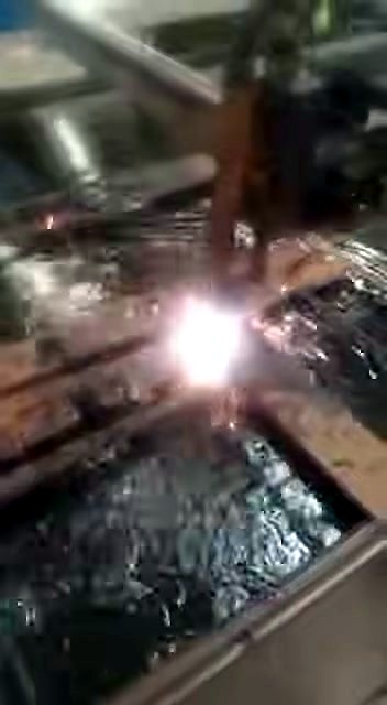 Fibre laser family: cutting metal with sparks (SKU ask)