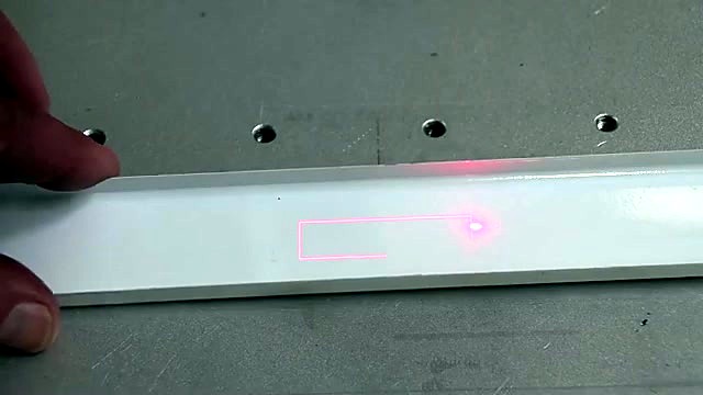 Red guide laser box on powder-coated strip (SKU ask)