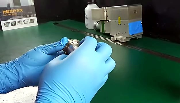 Conical silver housing over green mat (SKU ask)