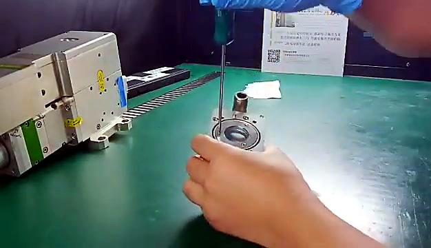 Screwdriver on corner screw of silver housing (SKU ask)