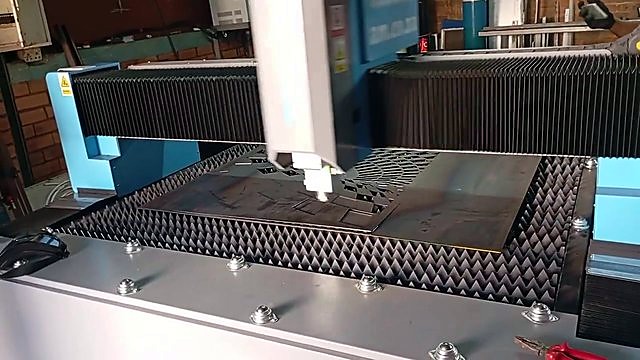 Wide light-blue gantry over vortex sheet cut (SKU ask)