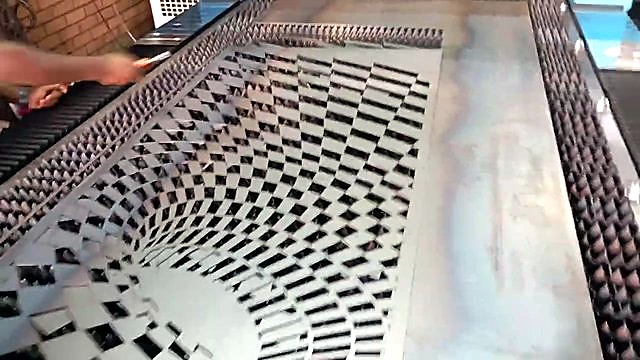 Concentric rectangular vortex lattice detail on steel (SKU ask)