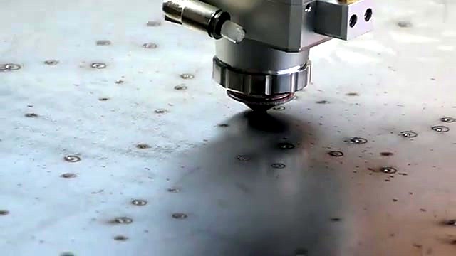 Cutting head piercing nested paths on mild steel (SKU ask)