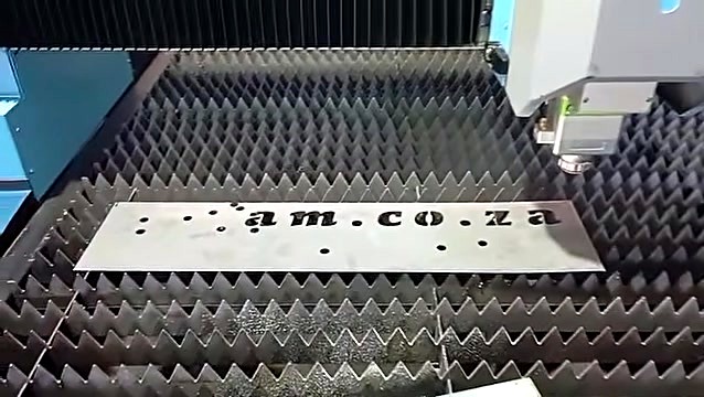 am.co.za logo cut progress on serrated slat bed (SKU ask)