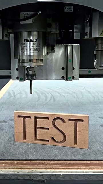 Spindle over brown TEST wood cutout (SKU ask)