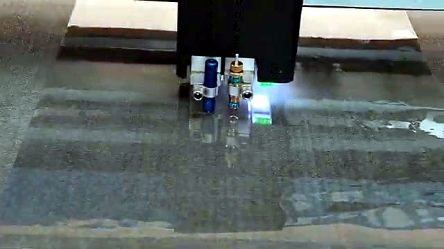 Dual-tool head over translucent sheet (SKU ask)
