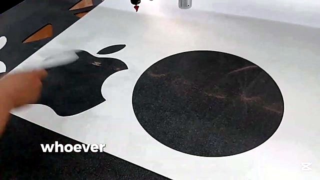 Black Apple inlay fitted into white cutout (SKU ask)