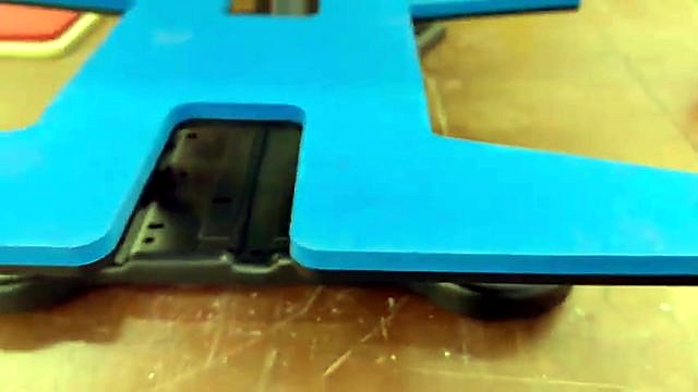 Blue foam contoured lower platen seated on support (SKU ask)