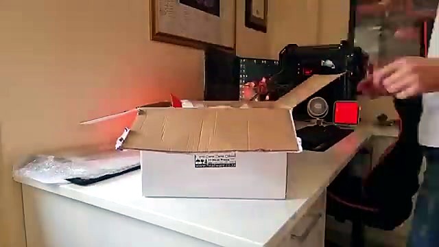 Unbox portable press on desk (SKU ask)