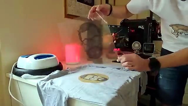 Peel carrier after circular transfer on white tee (SKU ask)
