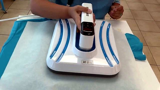 Handheld white/blue press on blue tee (SKU ask)
