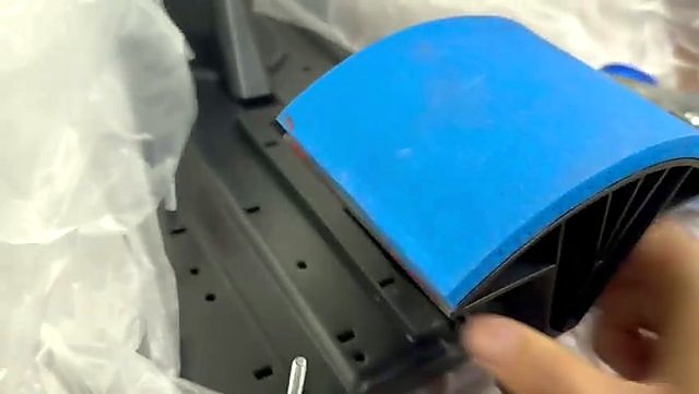 Blue silicone pad on black ribbed support (SKU ask)