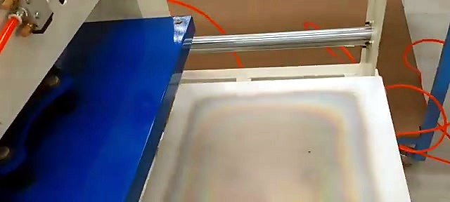 White sliding platen under blue head (SKU ask)
